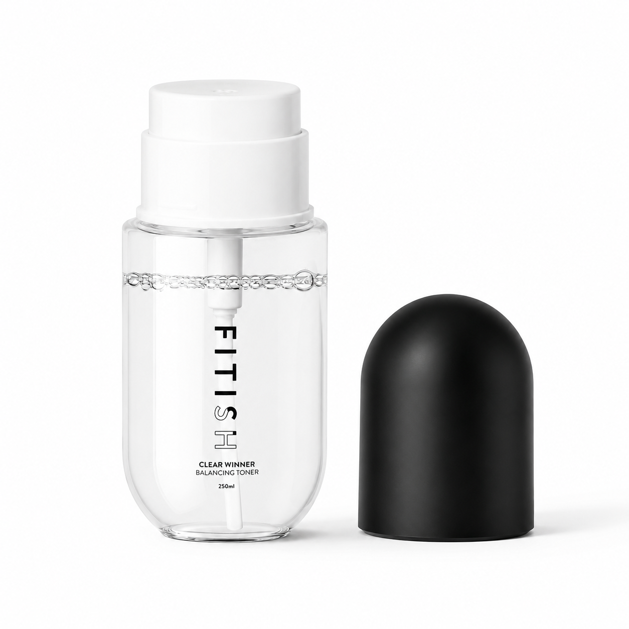 A clear cosmetic pump bottle labeled FITISH with a white pump and a separate black cap placed beside it on a clean white background.