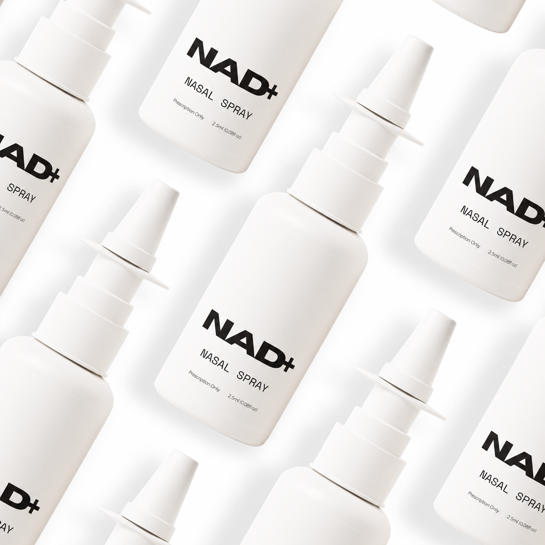 Multiple NAD+ nasal spray bottles arranged on a light background