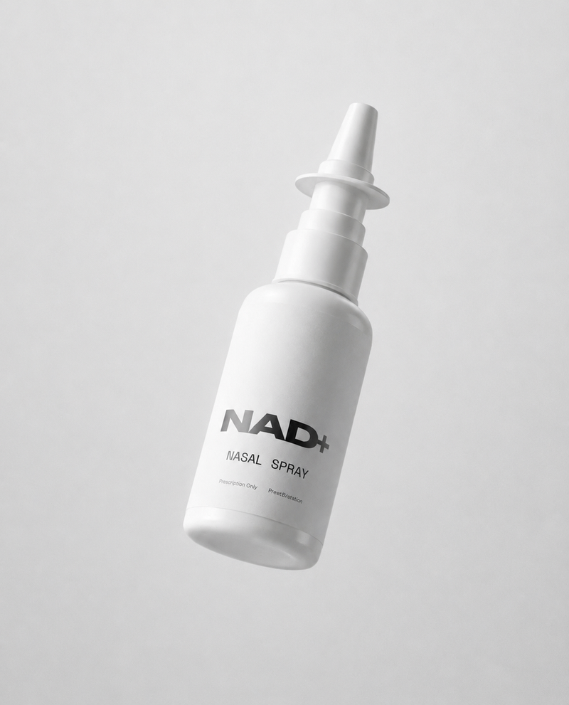 floating nasal spray labeled NAD+ on gray background